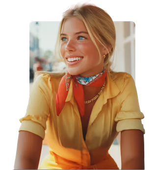 A girl traveling and looking happy wearing a yellow shirt and red scarf.